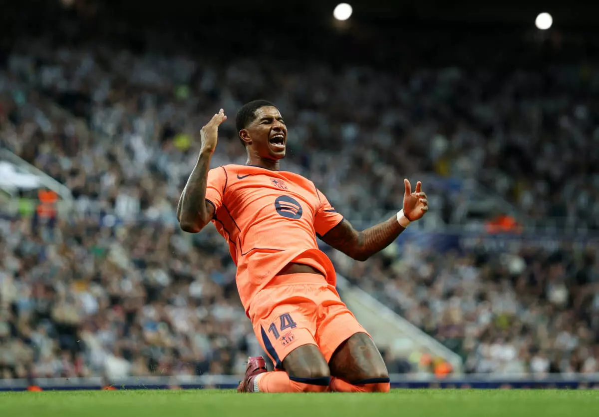 NEWCASTLE UPON TYNE, ENGLAND - SEPTEMBER 18: Marcus Rashford of FC Barcelona celebrates scoring his team's first goal during the UEFA Champions League 2025/26 League Phase MD1 match between Newcastle United FC and FC Barcelona at St James' Park on September 18, 2025 in Newcastle upon Tyne, England. (Photo by Michael Regan - UEFA/UEFA via Getty Images)