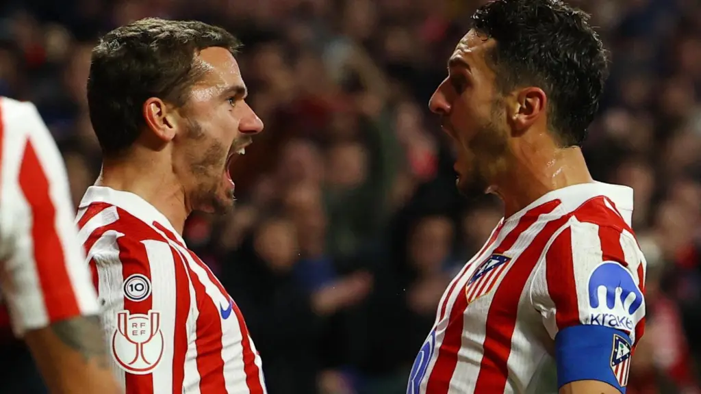 Griezmann y Koke, cara a cara en la celebración.